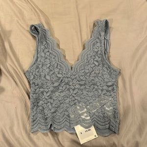 Never been worn, light blue top, Lacey